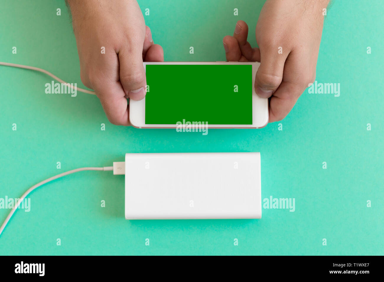 Smartphone charging with power bank Stock Photo Alamy