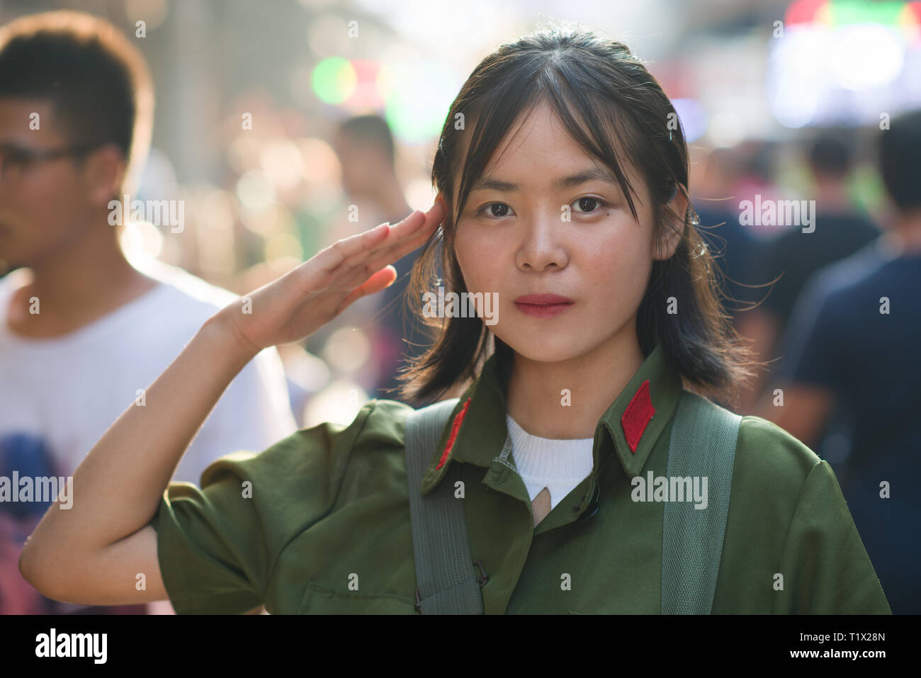 Chinese girl in PLA (People's Liberation Army) uniform from 60's/70's in Xi'An, Shaaxi, China Stock Photo