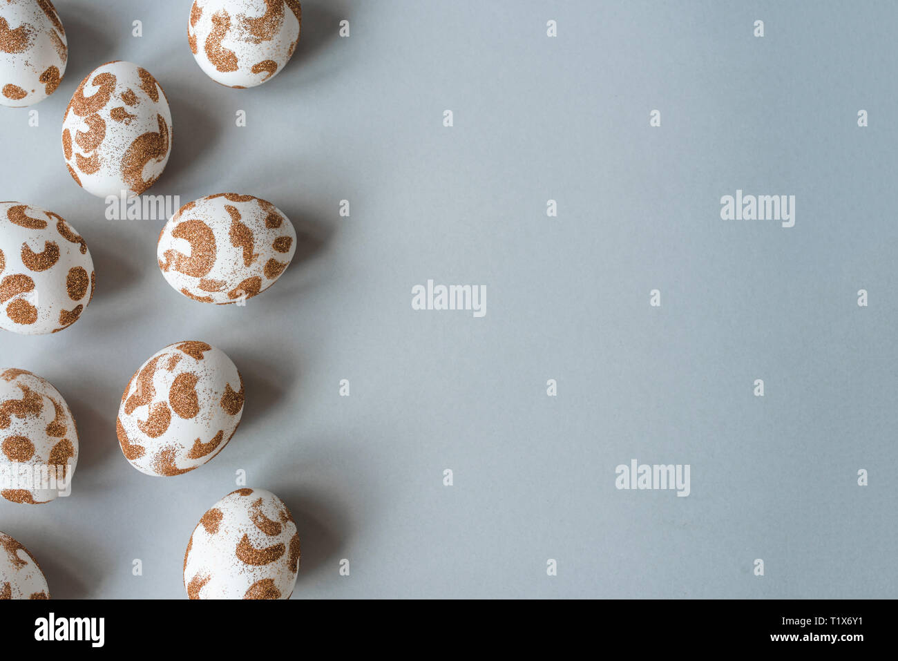 Stylish background with white easter eggs with copy space for text. Easter concept. Stock Photo