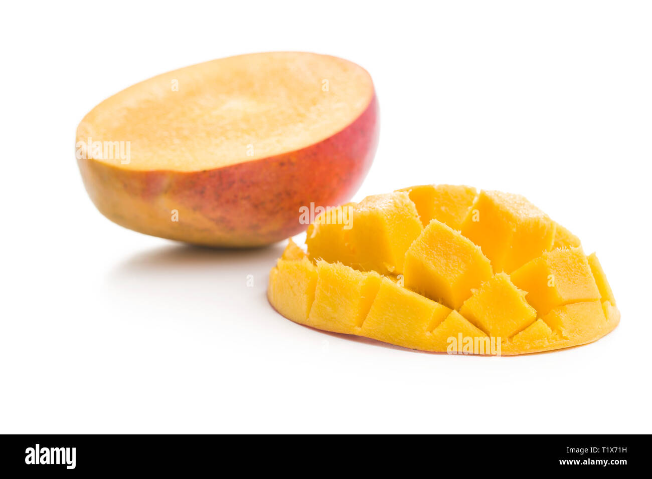 Ripe mango fruit isolated on white background. Stock Photo
