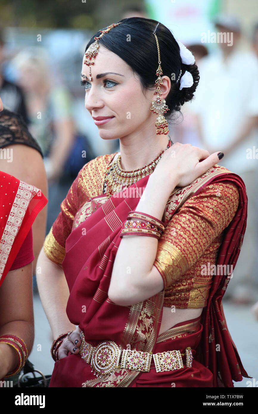 https://c8.alamy.com/comp/T1X7BW/rivne-ukraine-august-21-2010-beautiful-woman-in-indian-sari-costume-people-are-celebrating-the-fest-of-yoga-and-vedic-culture-a-hindu-festival-T1X7BW.jpg