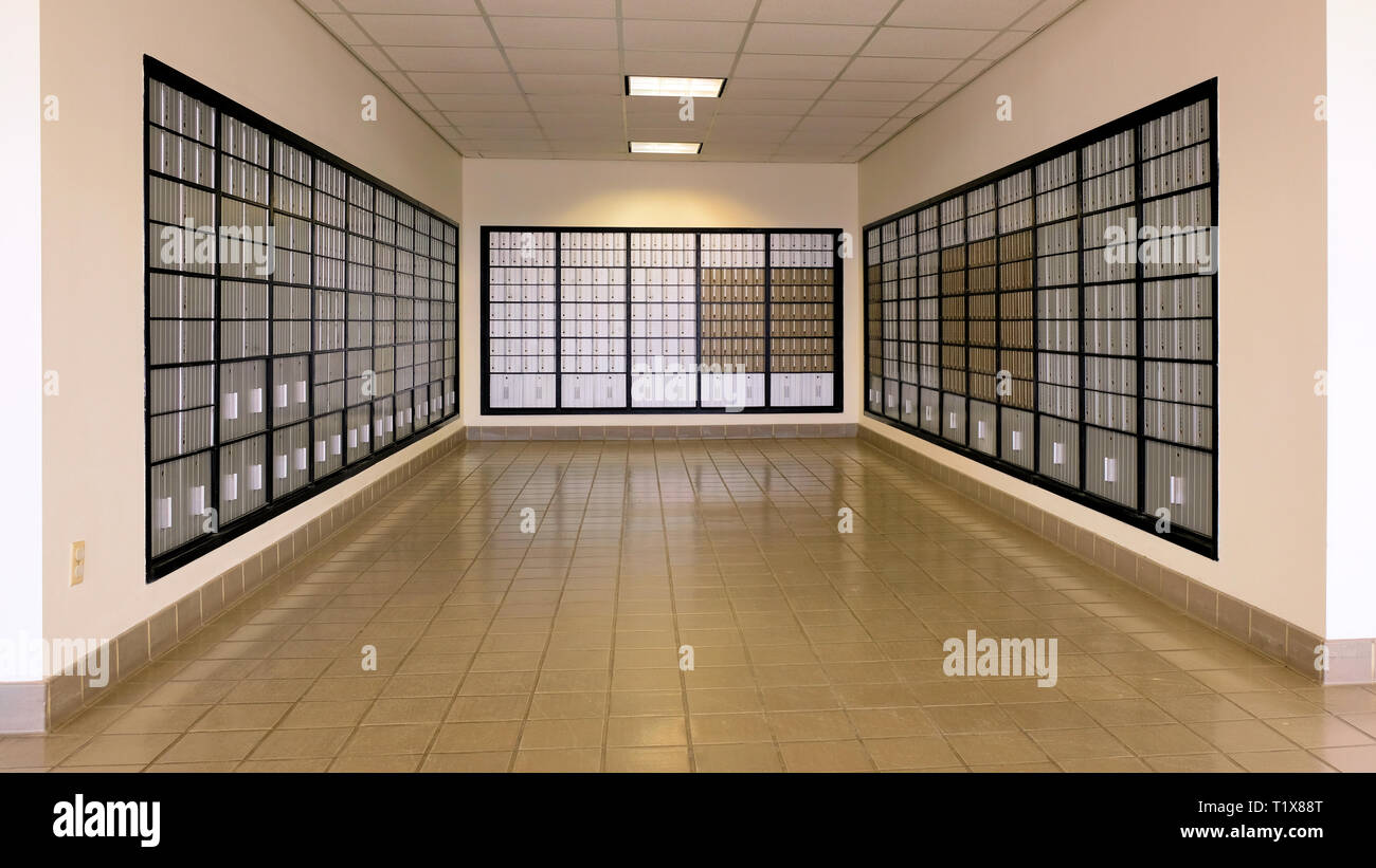 Steel silvercolored mailboxes at a United States Post Office; PO Box
