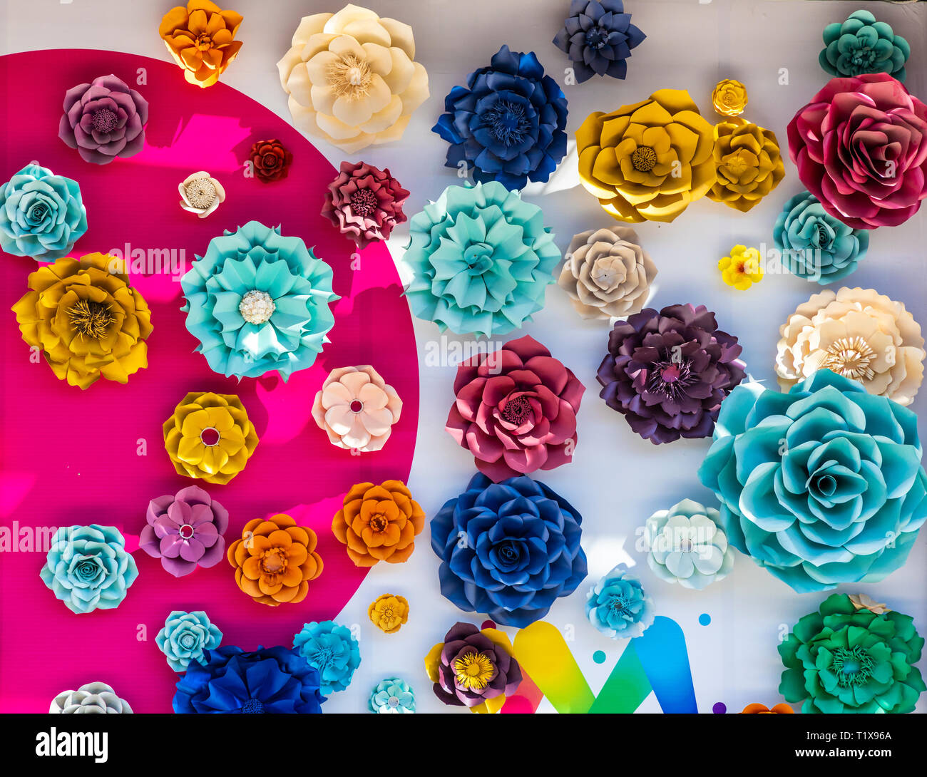 Colorful 3D wall flowers at Paseo Queretaro, a modern 'malltertainment' shopping mall and entertainment district located in Queretaro, Mexico Stock Photo