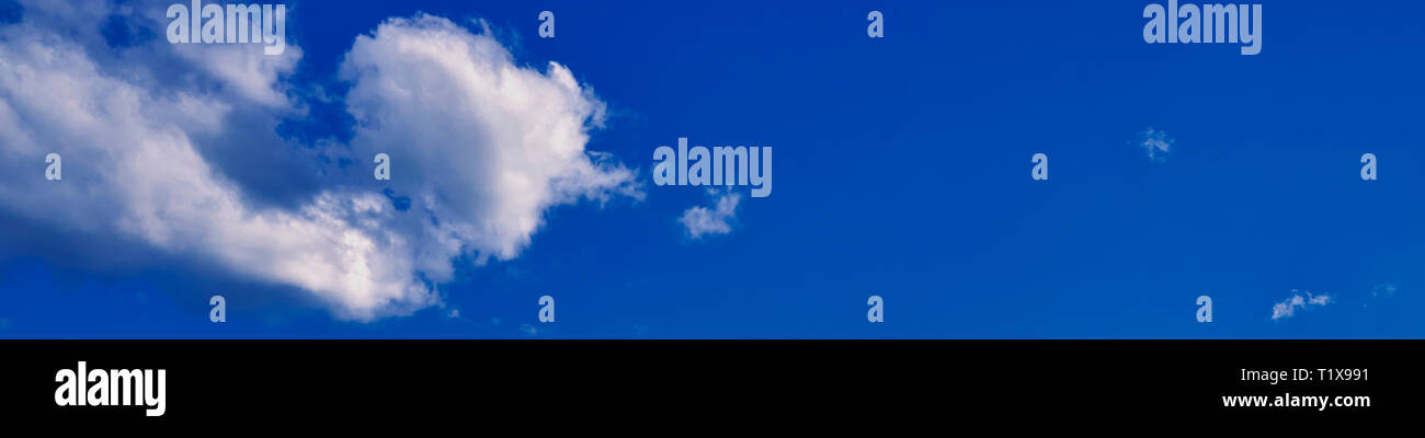 Blue sky background with white clouds. panorama Stock Photo - Alamy