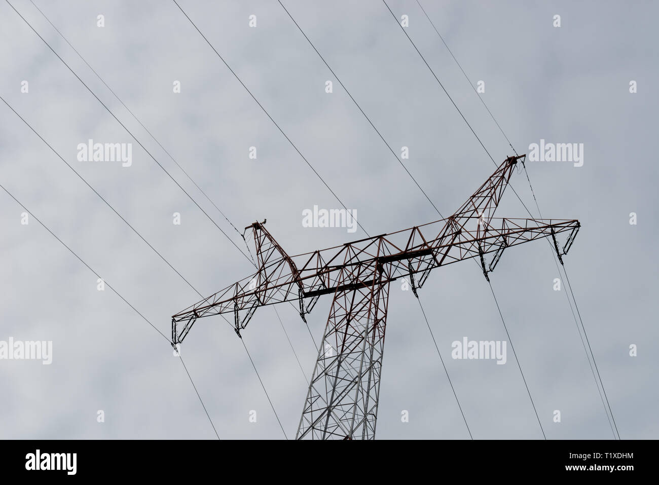 power tower on cloudy sky backround Stock Photo - Alamy