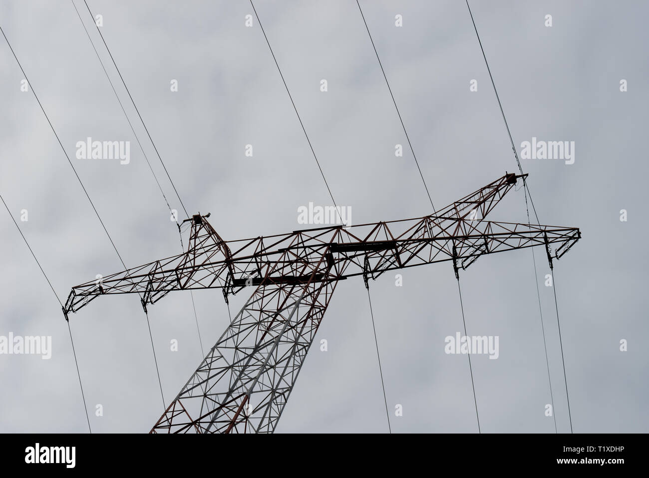 power tower on cloudy sky backround Stock Photo - Alamy