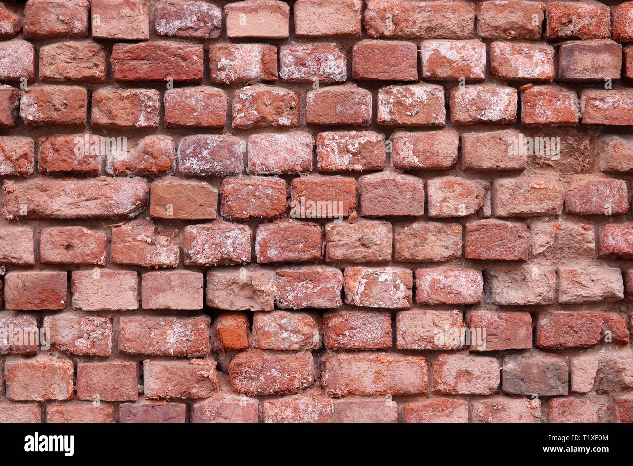 Red brick wall texture. Old facade of industrial building, vintage background Stock Photo