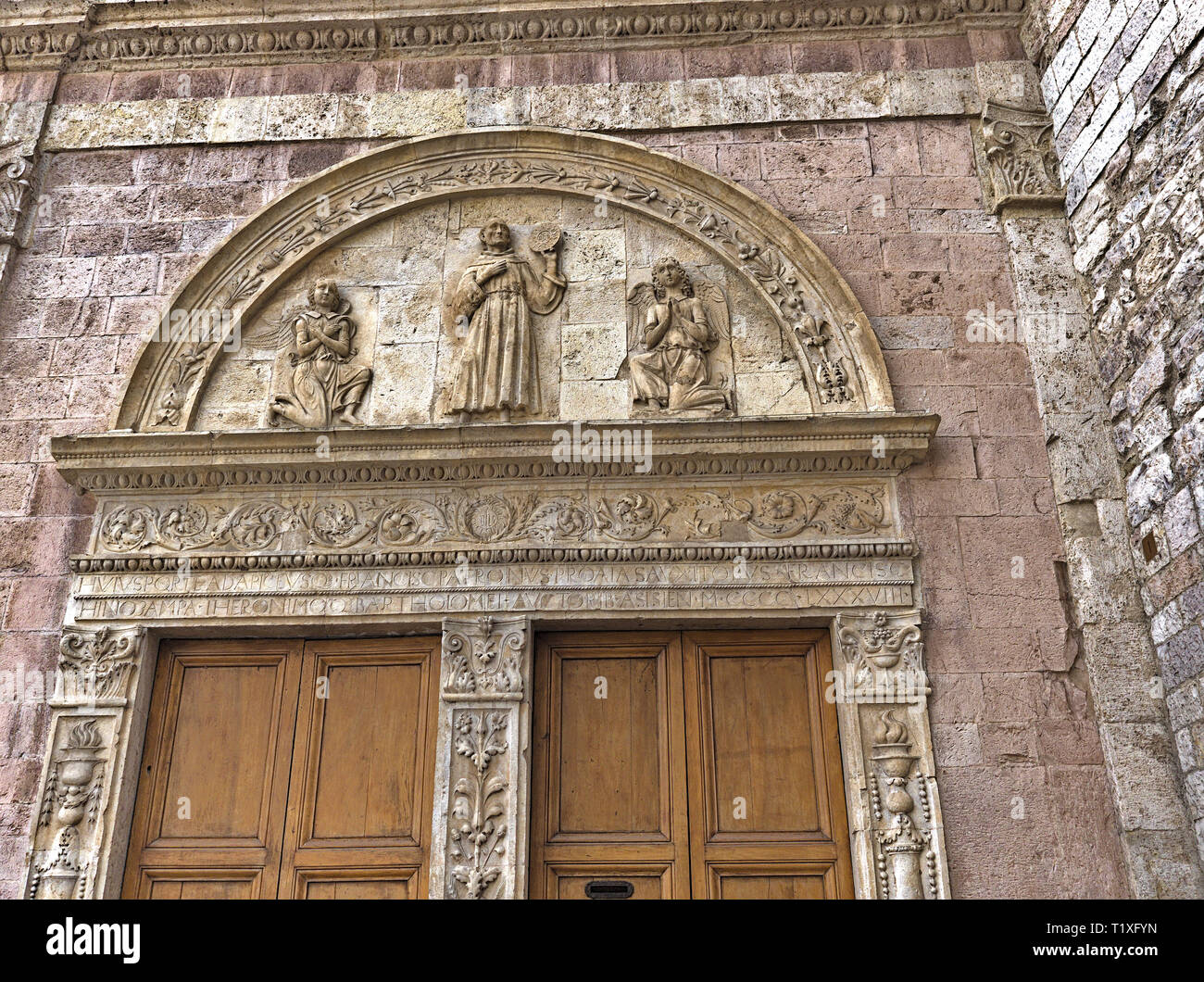 Assisi Umbria Italia - Italy. Basilica of Saint Francis (Basilica di San Francesco). Portal, detail. Stock Photo