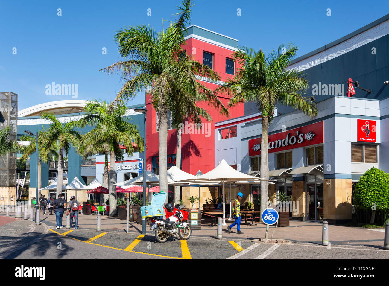 Fast food restaurants at entrance to Gateway Theatre of Shopping, Palm Boulevard, Umhlanga Ridge, Umhlanga, KwaZulu-Natal, South Africa Stock Photo