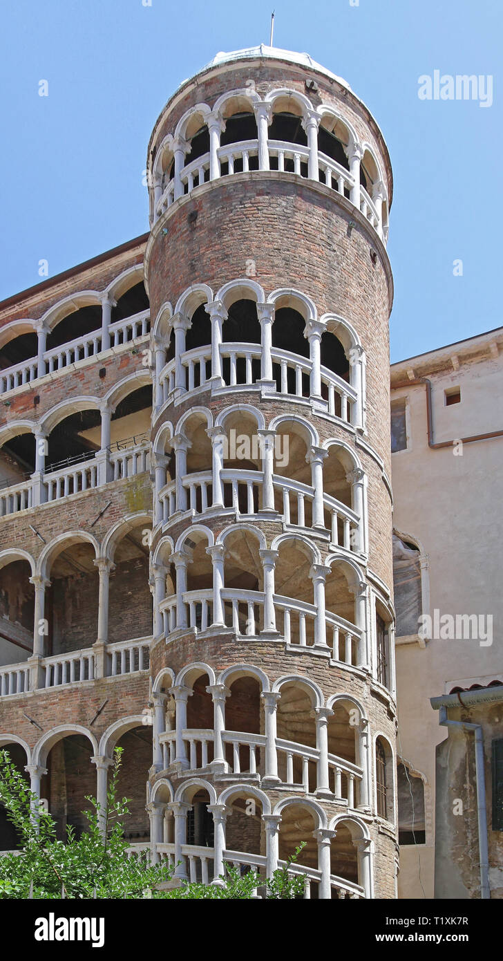 Tall External Spiral Staircase at Building in Venice Italy Stock Photo