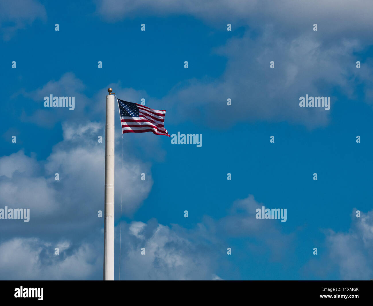 Old Glory Flying in the Wind in the middle of Orlando, Florida Stock Photo