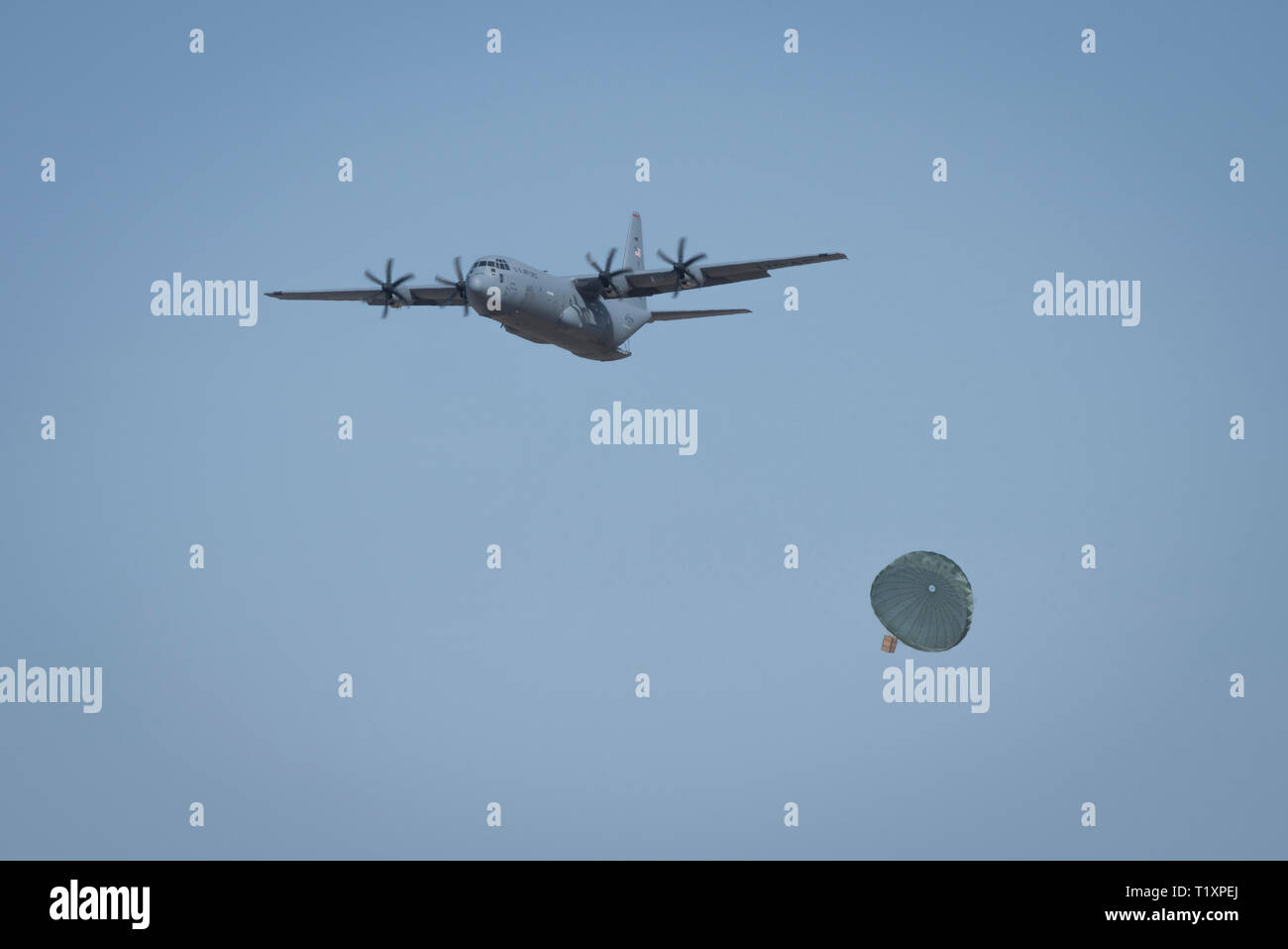 A 36th Airlift Squadron C-130J Super Hercules performs an airdrop ...
