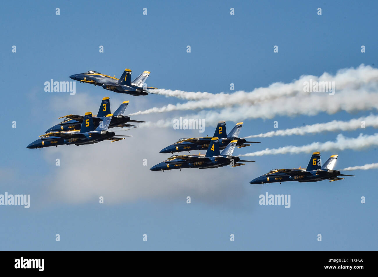 190323-N-UK306-1926 SALINAS, Calif. (March 23, 2019) The U.S. Navy Flight Demonstration Squadron, the Blue Angels, perform the “pitch up break“ maneuver during a demonstration at the California International Airshow at the Salinas Municipal Airport. The team is scheduled to conduct 61 flight demonstrations at 32 locations across the country to showcase the pride and professionalism of the U.S. Navy and Marine Corps to the American public in 2019. (U.S. Navy photo by Mass Communication Specialist 2nd Class Timothy Schumaker/Released) Stock Photo