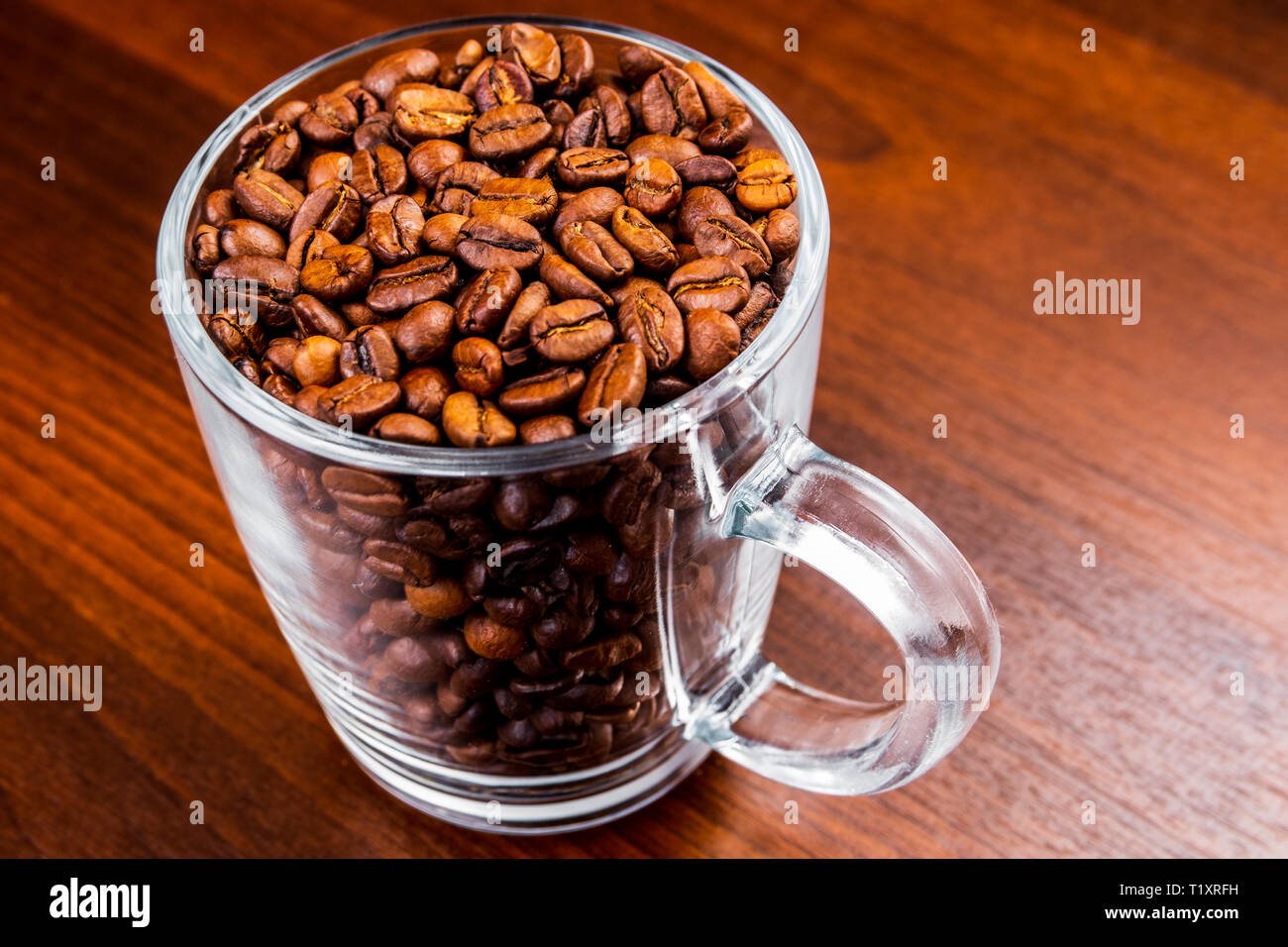 Cups Are Filled With Roasted Coffee Beans Close Up Shot White Cups  Different Sizes From Smallest To Largest On Grey Blurred Background Soft  Focus High-Res Stock Photo - Getty Images