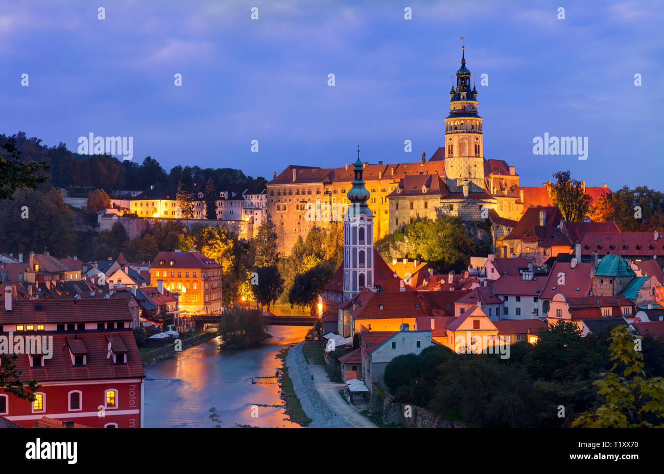 An illuminated evening view over the city of Cesky Krumlov in southern Bohemia, Czech Republic. Stock Photo