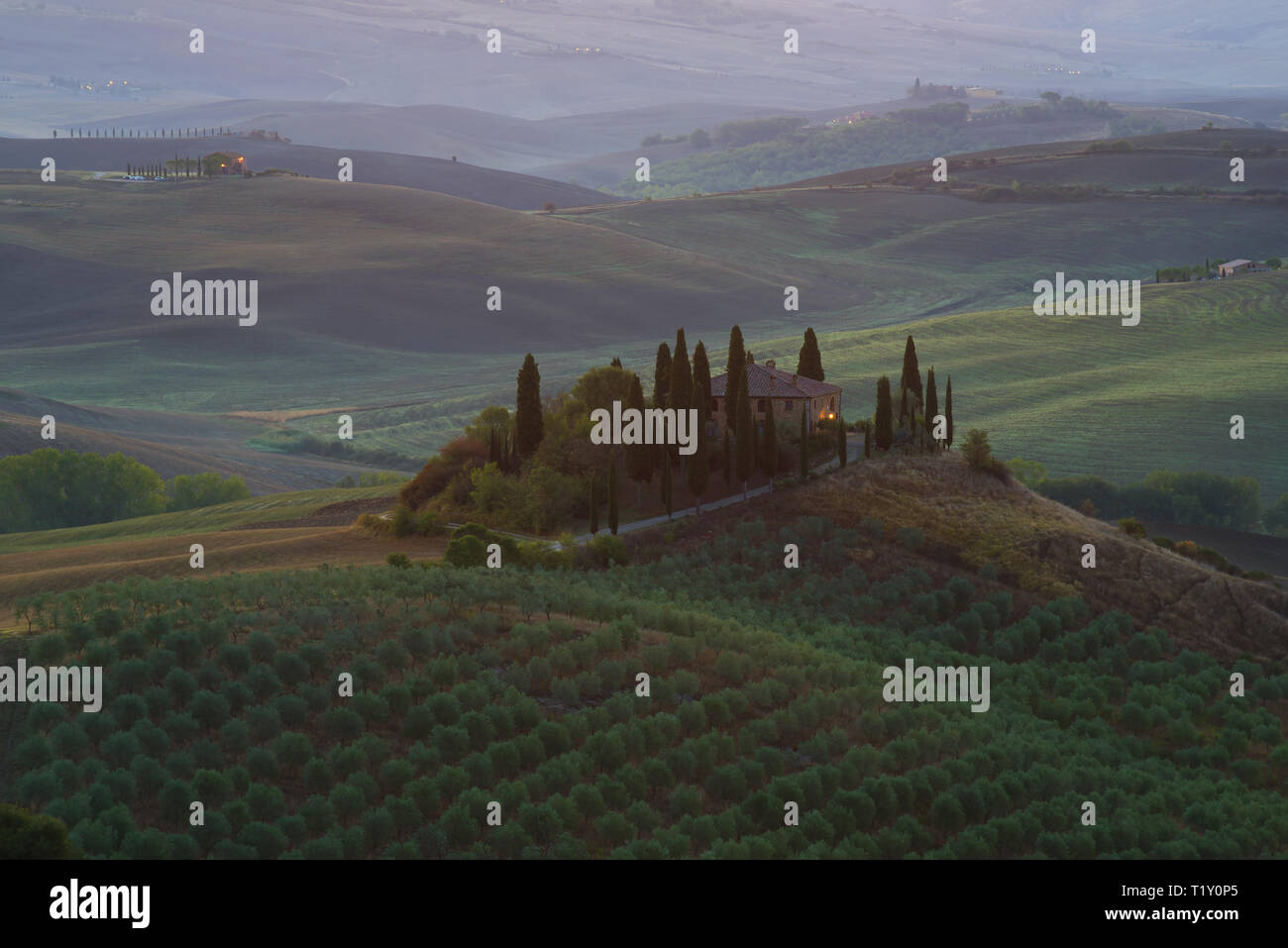View of the villa in the vicinity of the San Quirico D'orcia in the early September morning Stock Photo