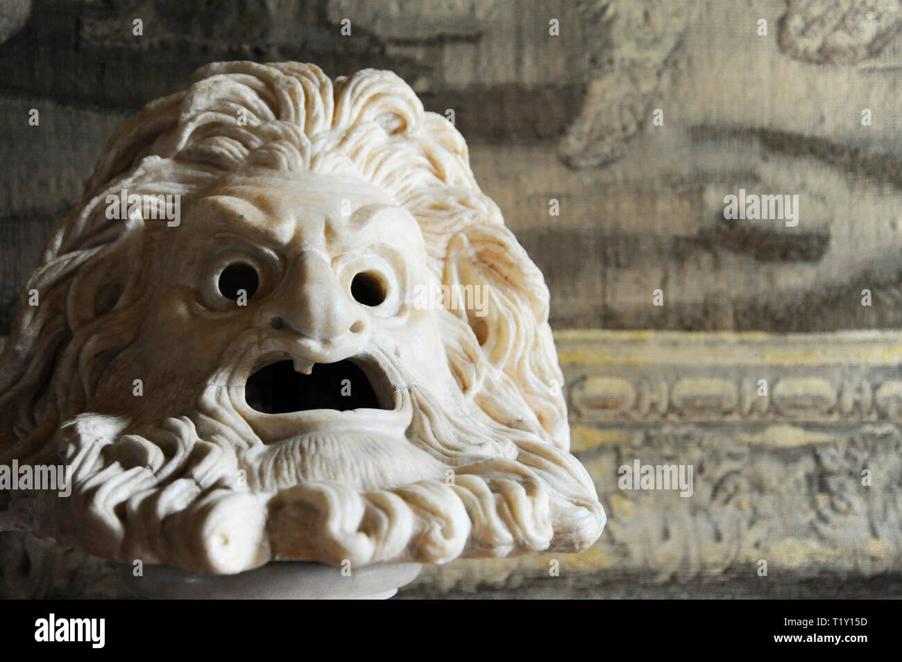 Greek or roman stlye theater mask sculpture Stock Photo
