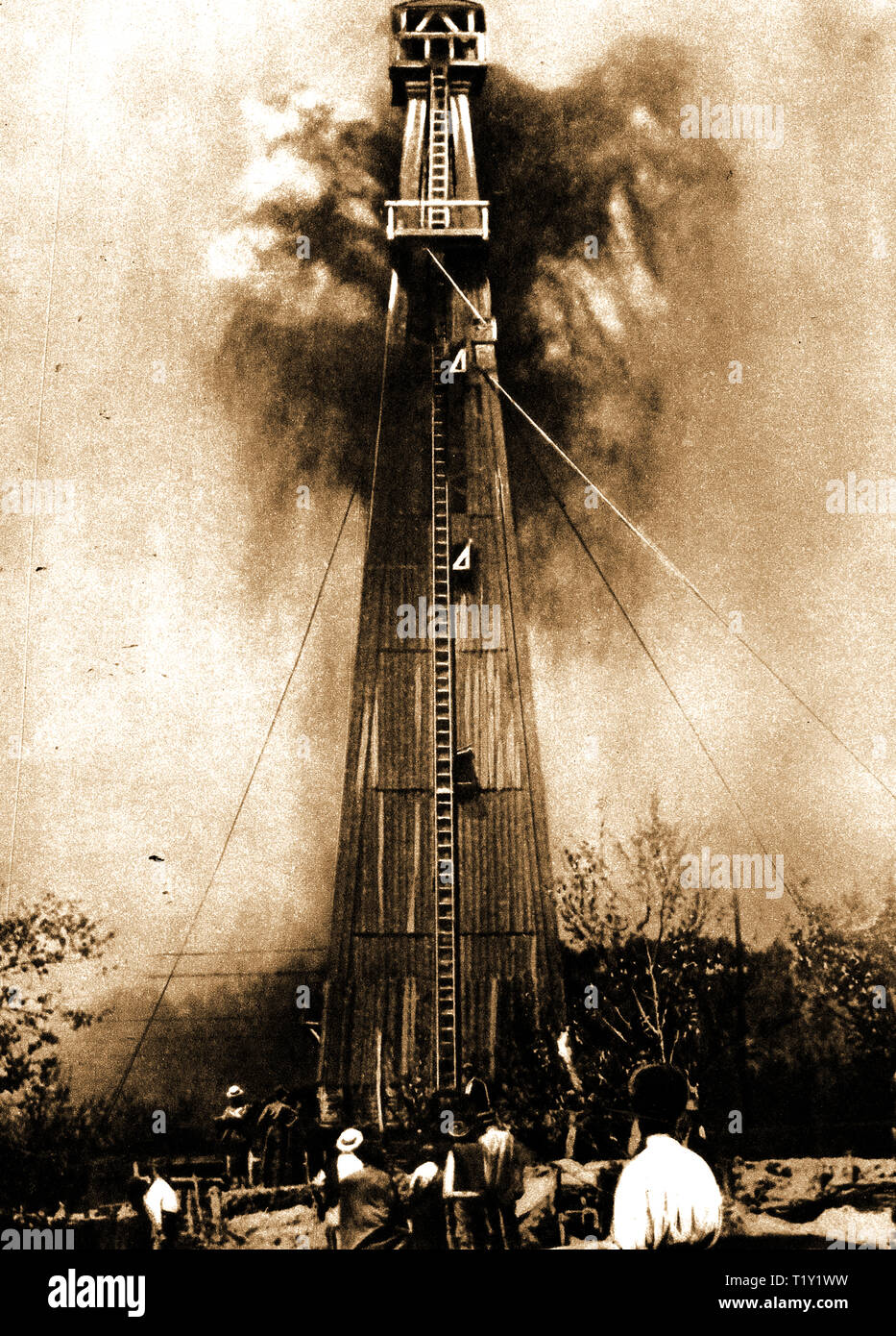 Rumanian Oil industry -Circa 1930's - A  rare photograph of a hand-dug petroleum bore-hole in Rumania, encased in wood and secured with guy ropes(Romania was the largest European producer of oil in World War II. Later in 1943 installations were bombed by the USA in 'Operation Tidal Wave' Stock Photo