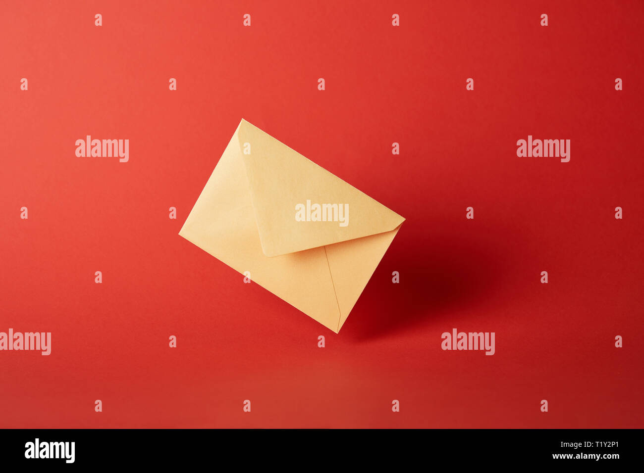 Download Bright Colorful And Yellow Envelope On Red Background With Copy Space Stock Photo Alamy PSD Mockup Templates