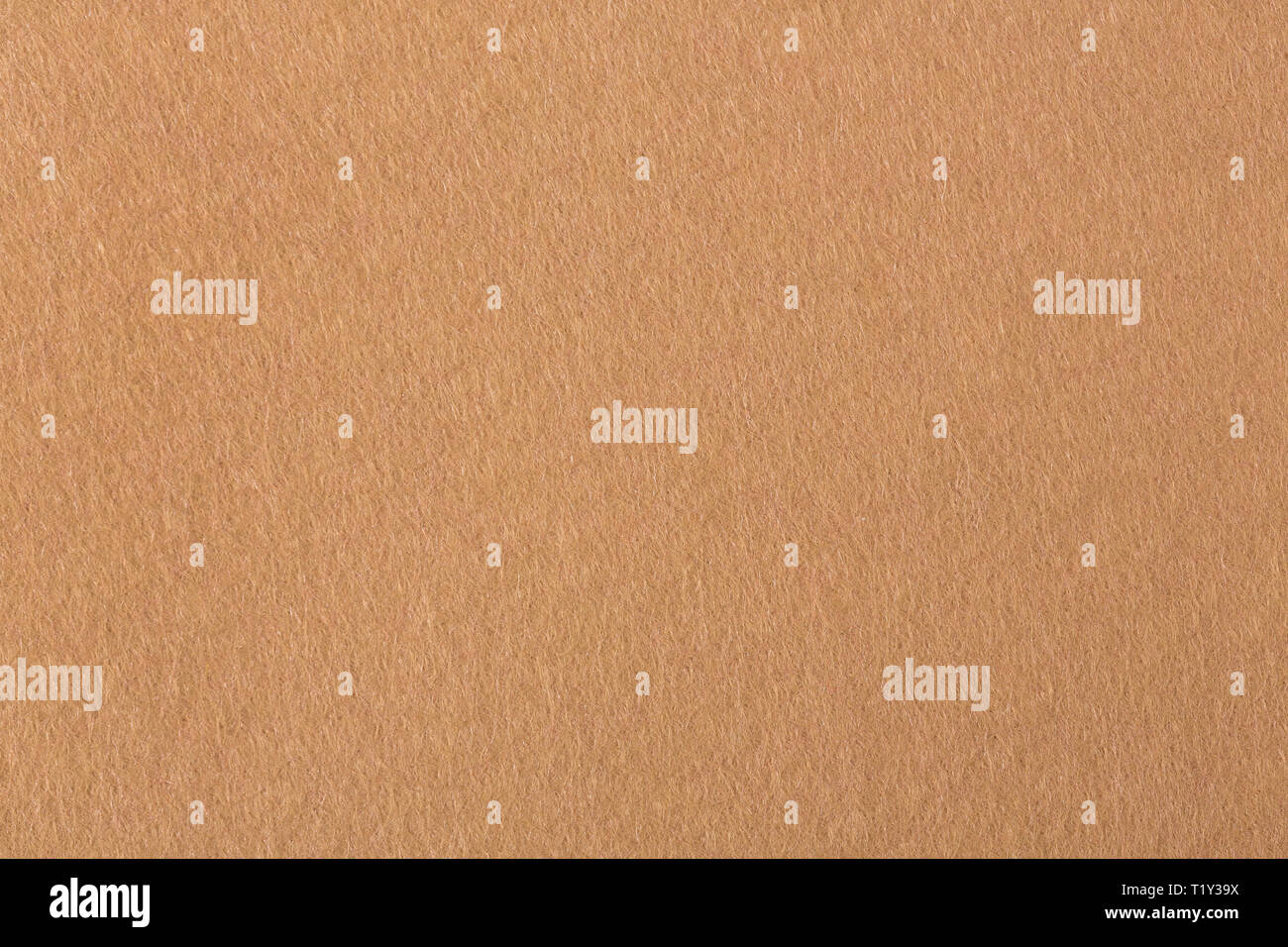 Background with brown felt texture. Felt material on macro. Stock Photo