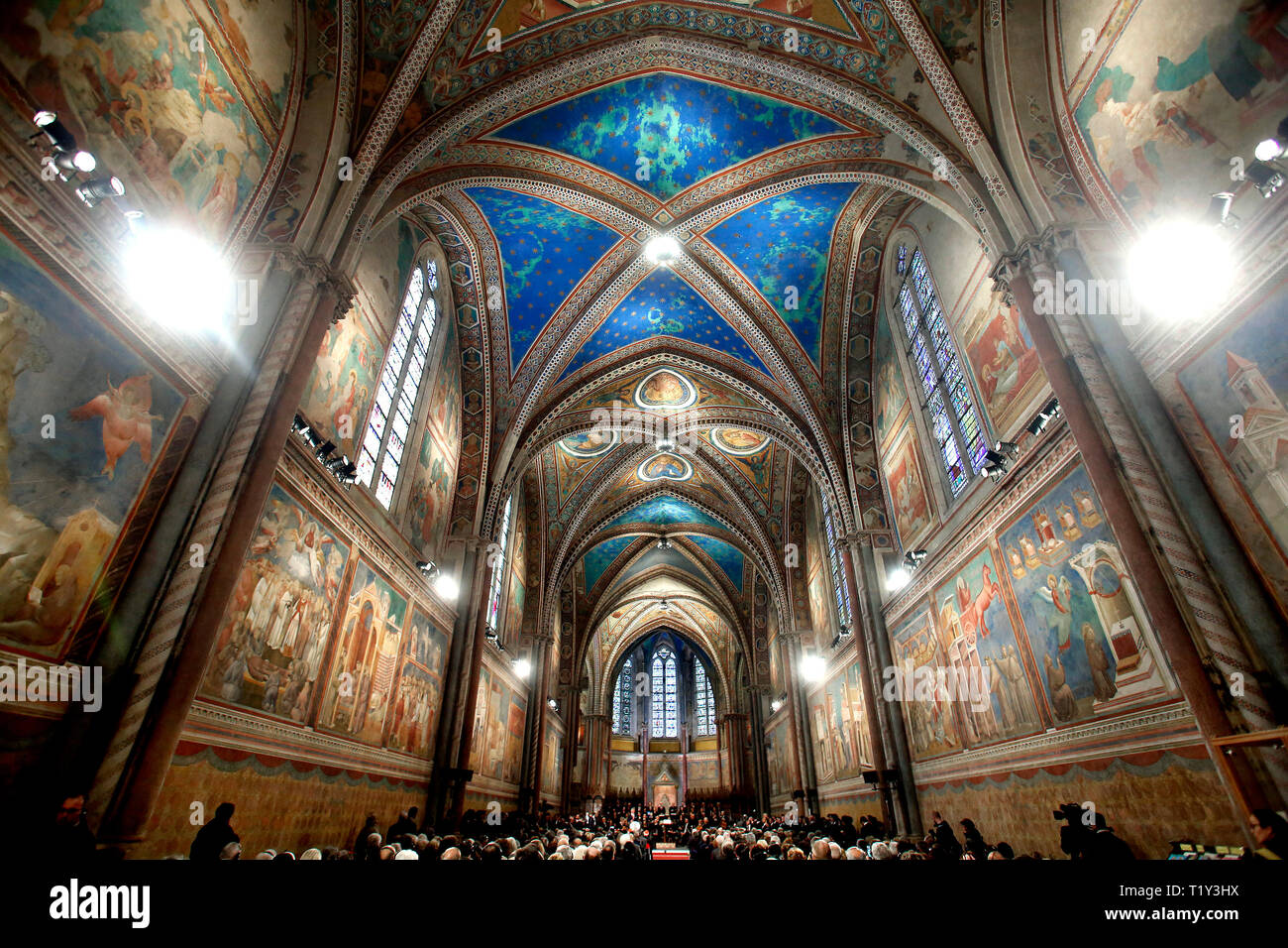 The upper basilica, frescoed by Cimabue Assisi March 29th 2019. The Basilica of Saint Francis of Assisi. On 16 July 1228, st Francis was canonized by  Stock Photo