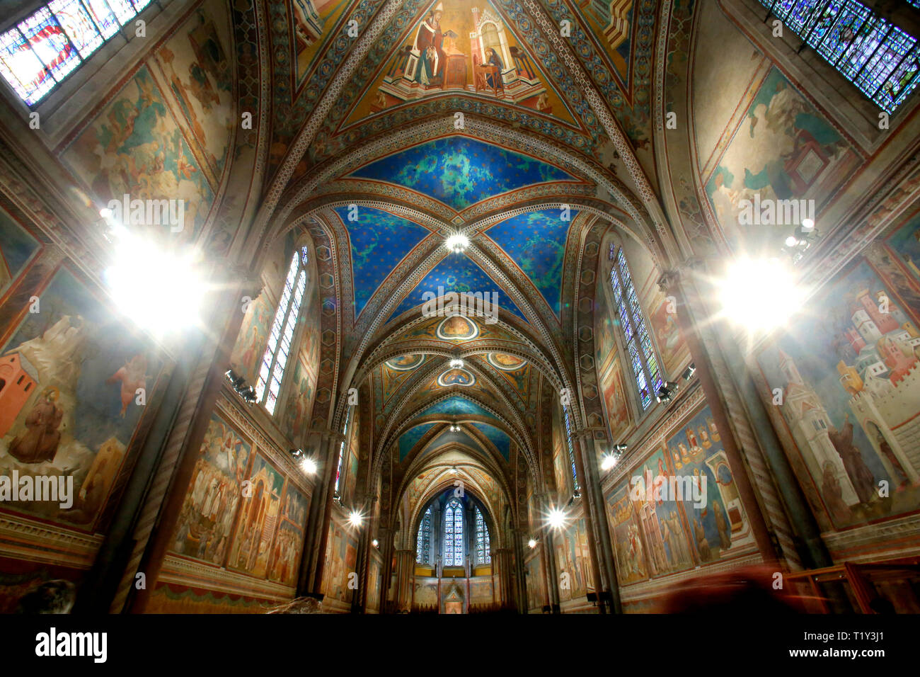 The upper basilica, frescoed by Cimabue Assisi March 29th 2019. The Basilica of Saint Francis of Assisi. On 16 July 1228, st Francis was canonized by  Stock Photo