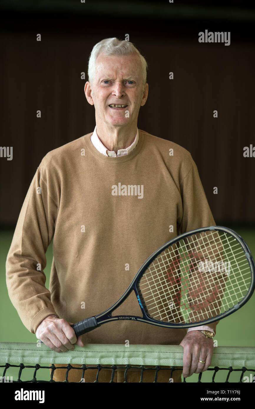 Hilden, Germany. 28th Mar, 2019. Wilhelm Bungert, former world-class tennis  player, stands on a tennis court of his tennis and golf ranch. Bungert  celebrates his 80th birthday on 01 April 2019. Credit: