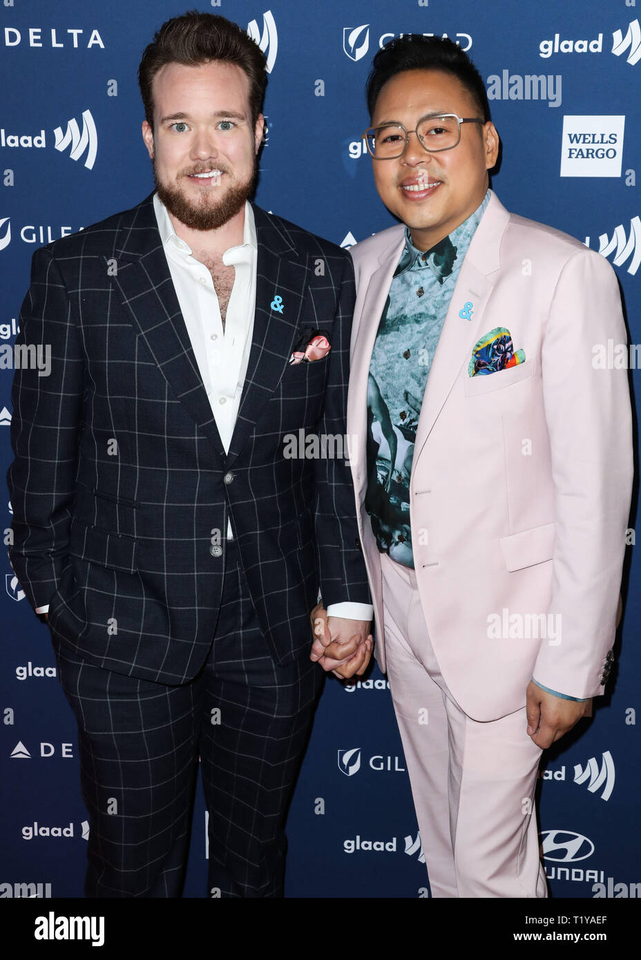 BEVERLY HILLS, LOS ANGELES, CALIFORNIA, USA - MARCH 28: Zeke Smith and Nico Santos arrive at the 30th Annual GLAAD Media Awards held at The Beverly Hilton Hotel on March 28, 2019 in Beverly Hills, Los Angeles, California, United States. (Photo by Xavier Collin/Image Press Agency) Stock Photo