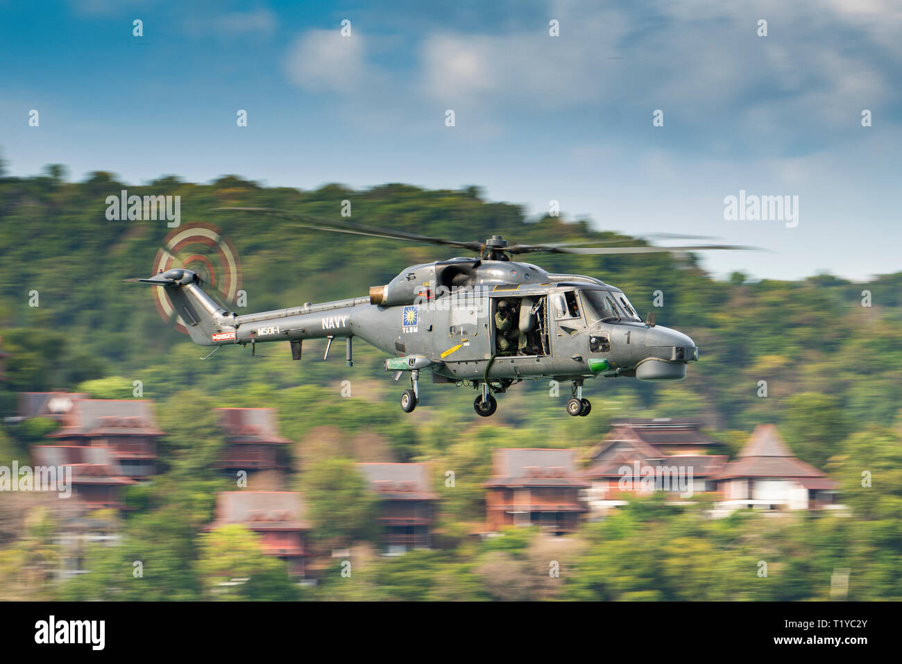 LANGKAWI, MALAYSIA : MARCH 28, 2019 : Malaysian Navy Super Lynx helicopter en route to a staged rescue operation at the LIMA exhibition Credit: Chung Jin Mac/Alamy Live News Stock Photo
