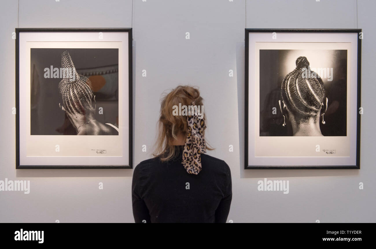 Sotheby’s London, UK. 29 March, 2019. Pre-sale exhibition of Modern and Contemporary African Art, showing the work of artists from across the African diaspora. Image: J.D. ‘Okhai Ojeikere, Hairstyles Series. Estimate (each) £3,000-5,000. Credit: Malcolm Park/Alamy Live News. Stock Photo