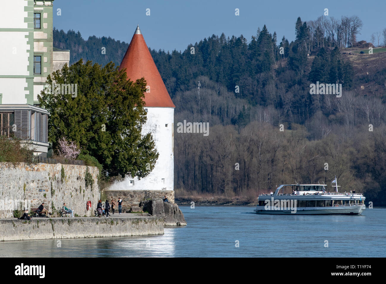 29 March 2019, Bavaria, Passau: There's a boat out on the Inn. Photo: Armin Weigel/dpa Stock Photo