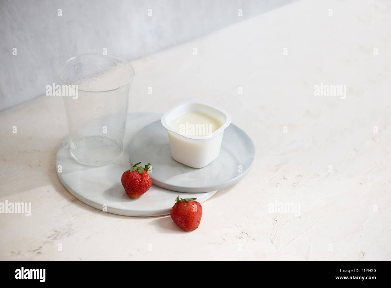 Download Fruit Yogurt In Plastic Container With One Strawberry On White Background Stock Photo 242165896 Alamy PSD Mockup Templates