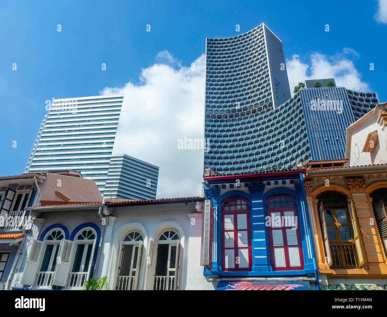 DUO and Gateway office towers over Arab Street traditional shophouses fabric shops Kampong Glam Singapore. Stock Photo