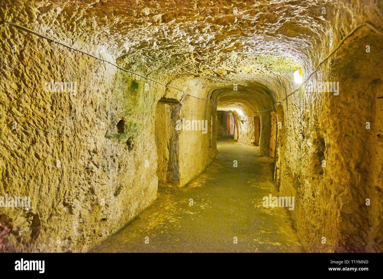 RABAT, MALTA - JUNE 16, 2018: The long stone tunnel with small shelters, located under historical Wignacourt Residence was used during the WWII, on Ju Stock Photo