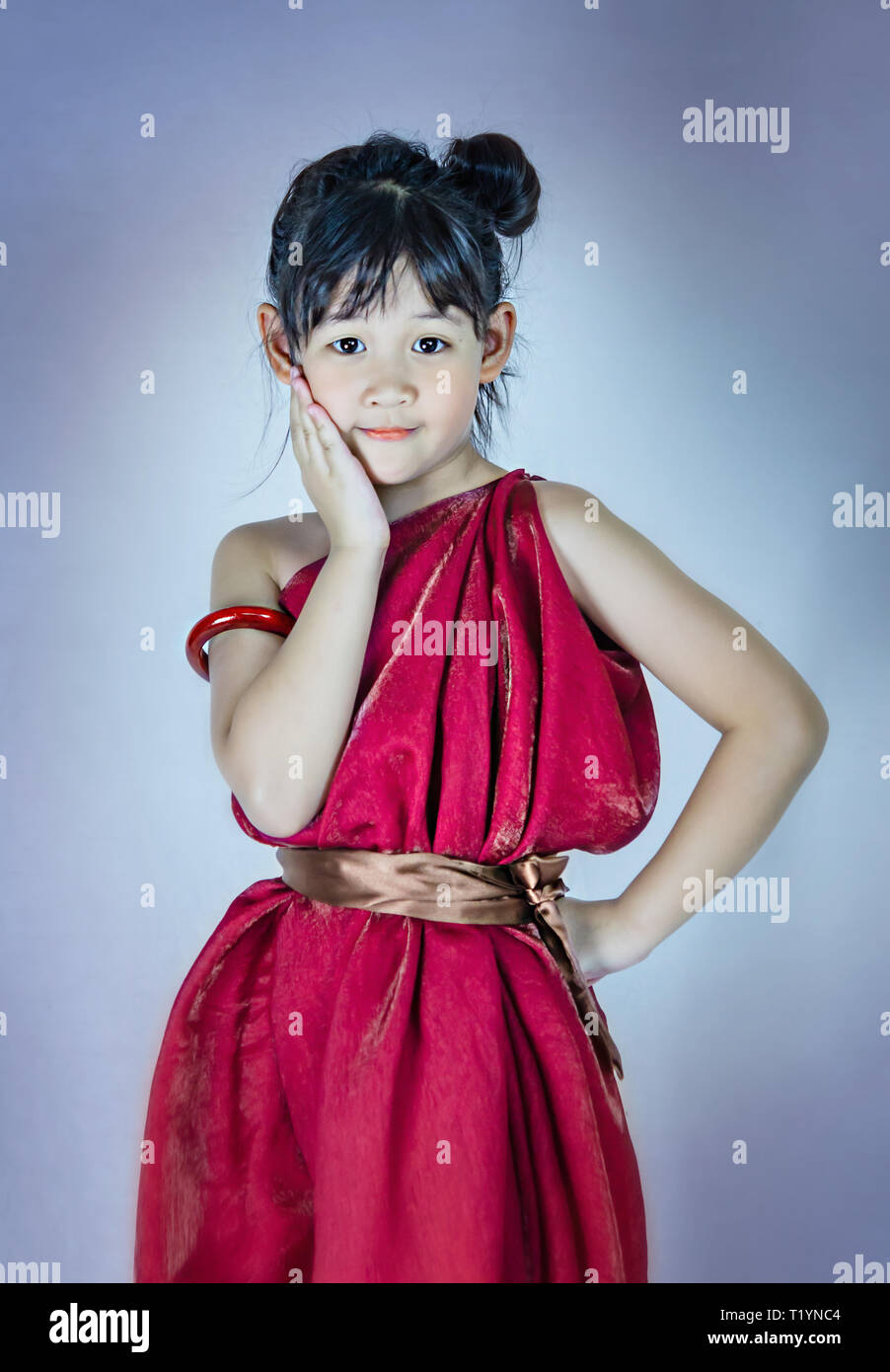 Portrait of asian little girl in red dress Stock Photo - Alamy