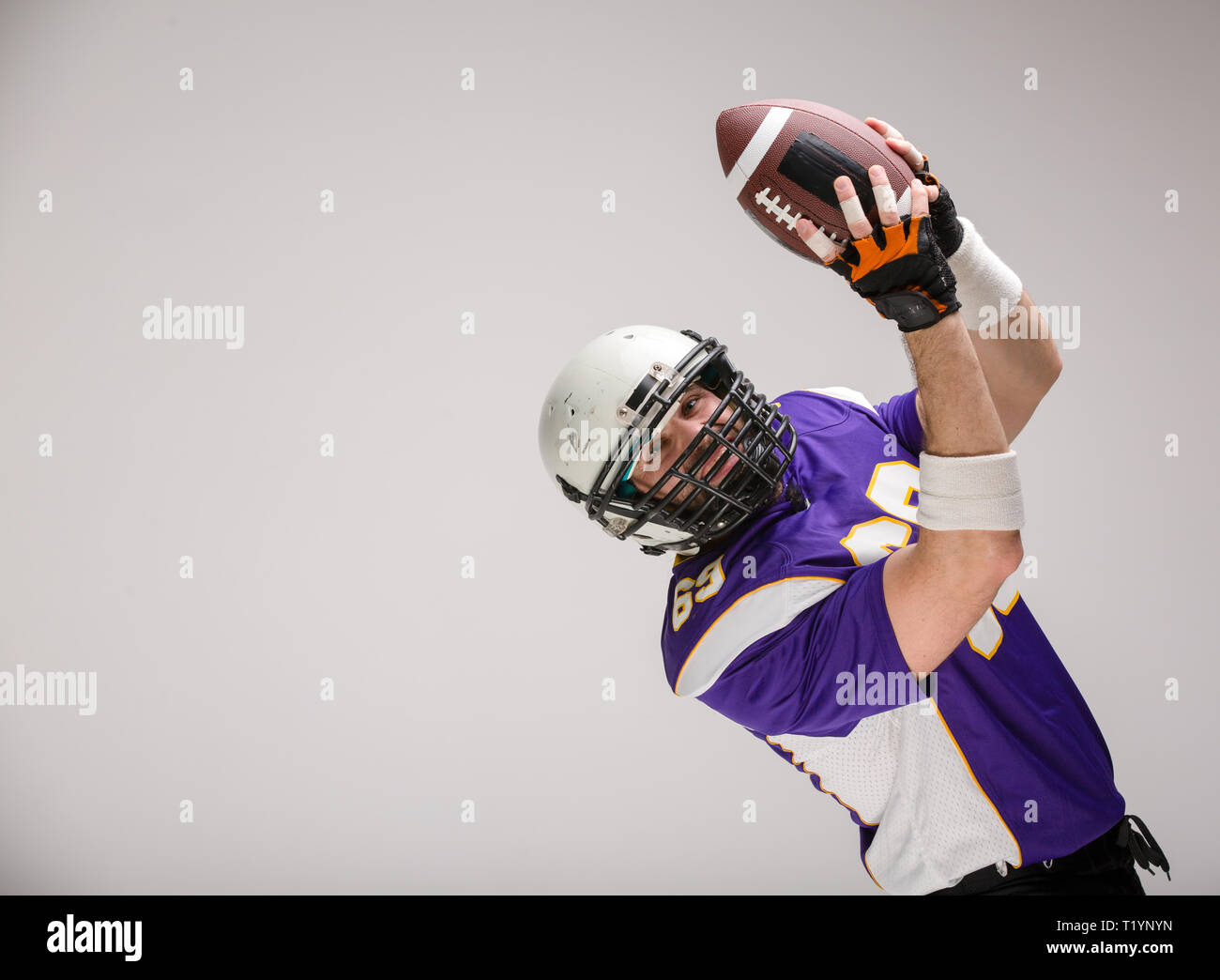 Football Player With Clipping Path Stock Photo - Download Image