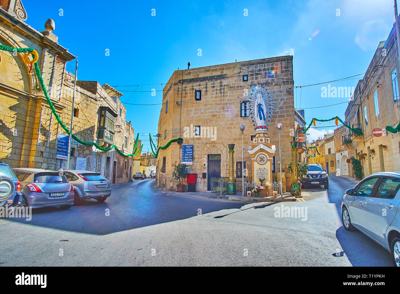 SIGGIEWI, MALTA - JUNE 16, 2018: The statue of Virgin Mary decorates the small square of St Margarita, located in old town, on June 16 in Siggiewi Stock Photo