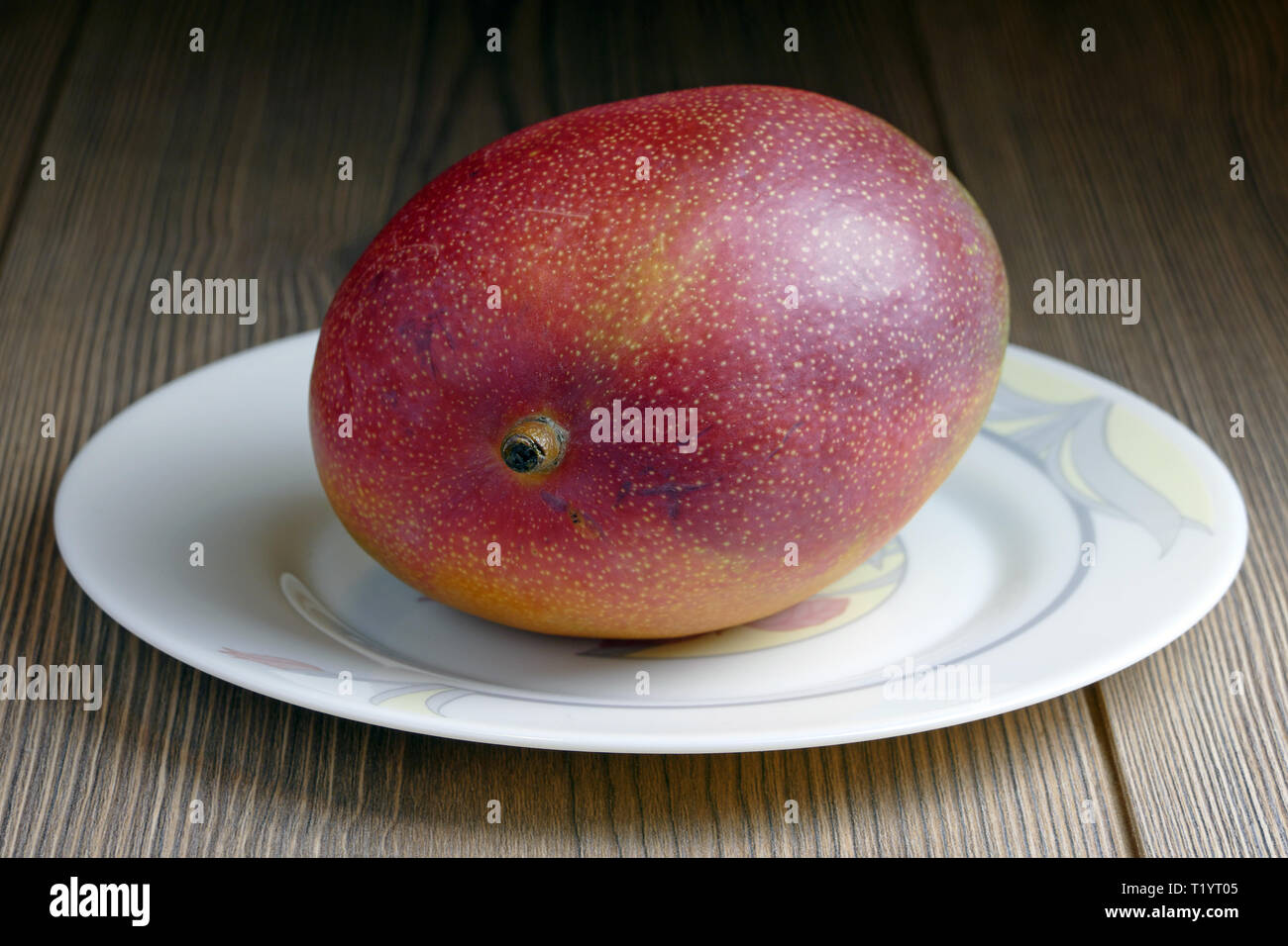 Mango on a table Stock Photo