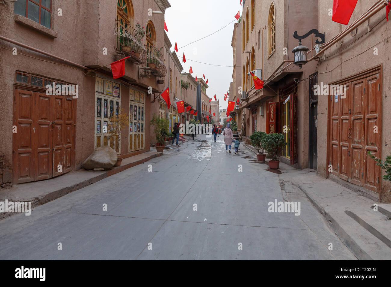 Street in Kashgar Old Town during Chinese National Holiday (Xinjiang Province, China) Stock Photo