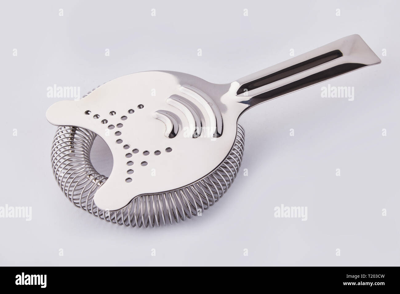 Cocktail strainer, tool of the bartender on white background. Bartender