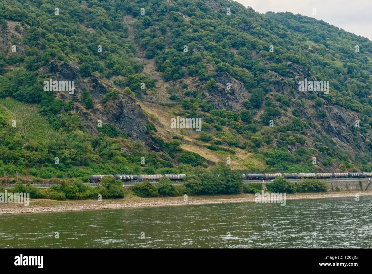 Freight train near the Rhine in the UNESCO World Heritage in the Upper Middle Rhine Valley, Germany Stock Photo