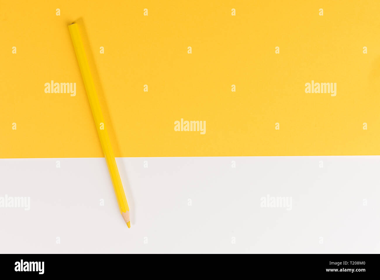 Colored pencil on color paper background Stock Photo Alamy