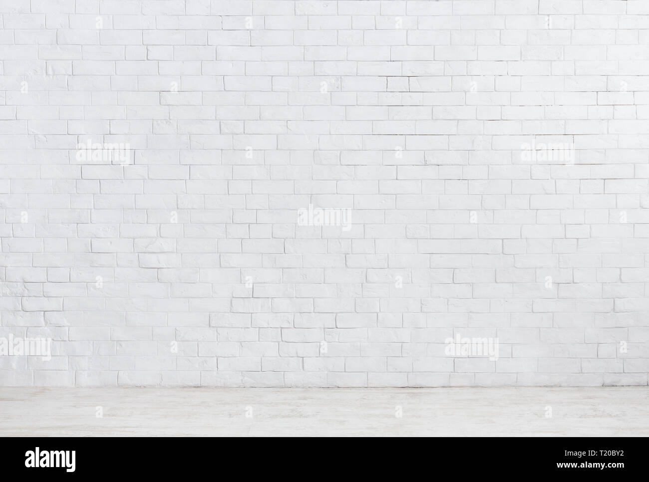 White brick wall and white wooden floor background Stock Photo - Alamy