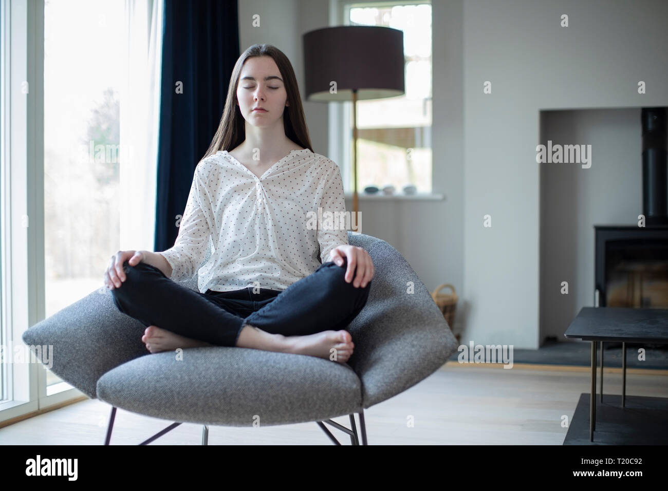 Meditation sitting chair hires stock photography and images Alamy