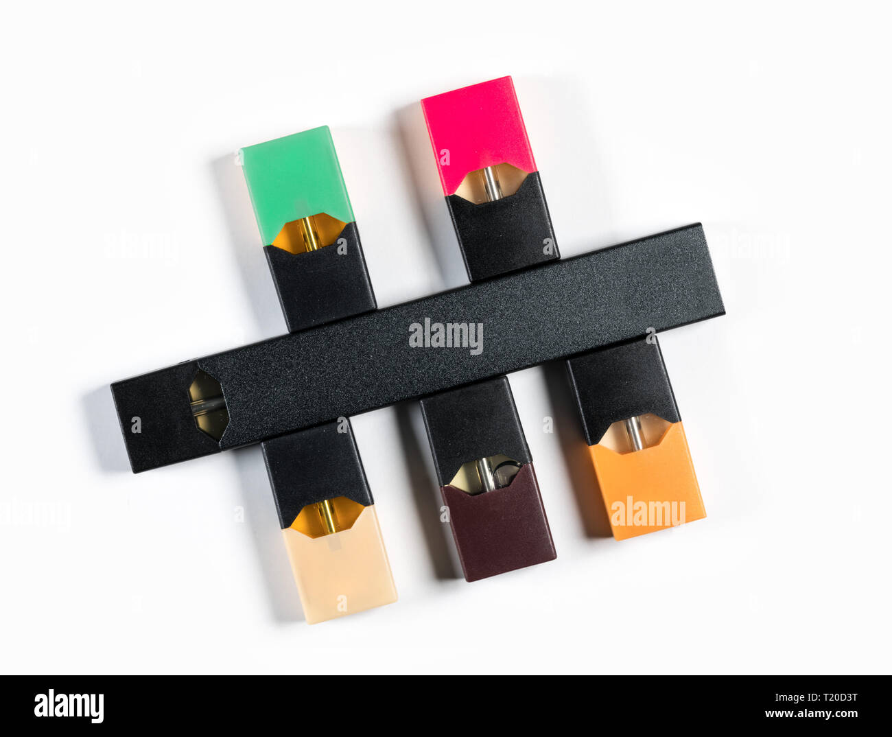 Modern electronic cigarette dispenser with different flavors of nicotine  Stock Photo