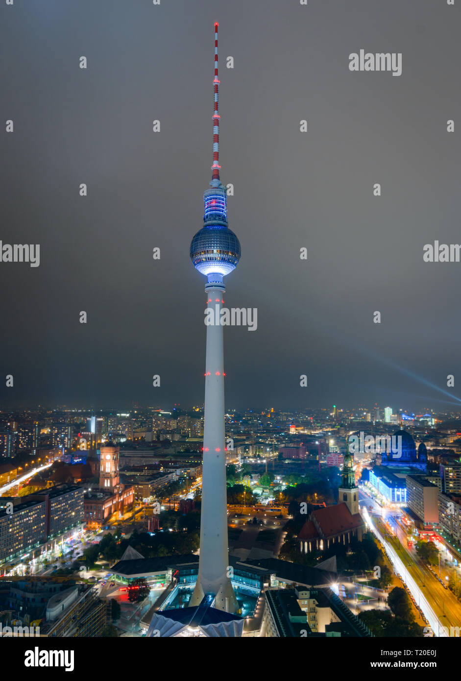 BERLIN, GERMANY - 5 Oct 2013: The Fernsehturm, a famous Berlin landmark is lit during the Light Fest 2013, at night in Berlin, Germany Stock Photo
