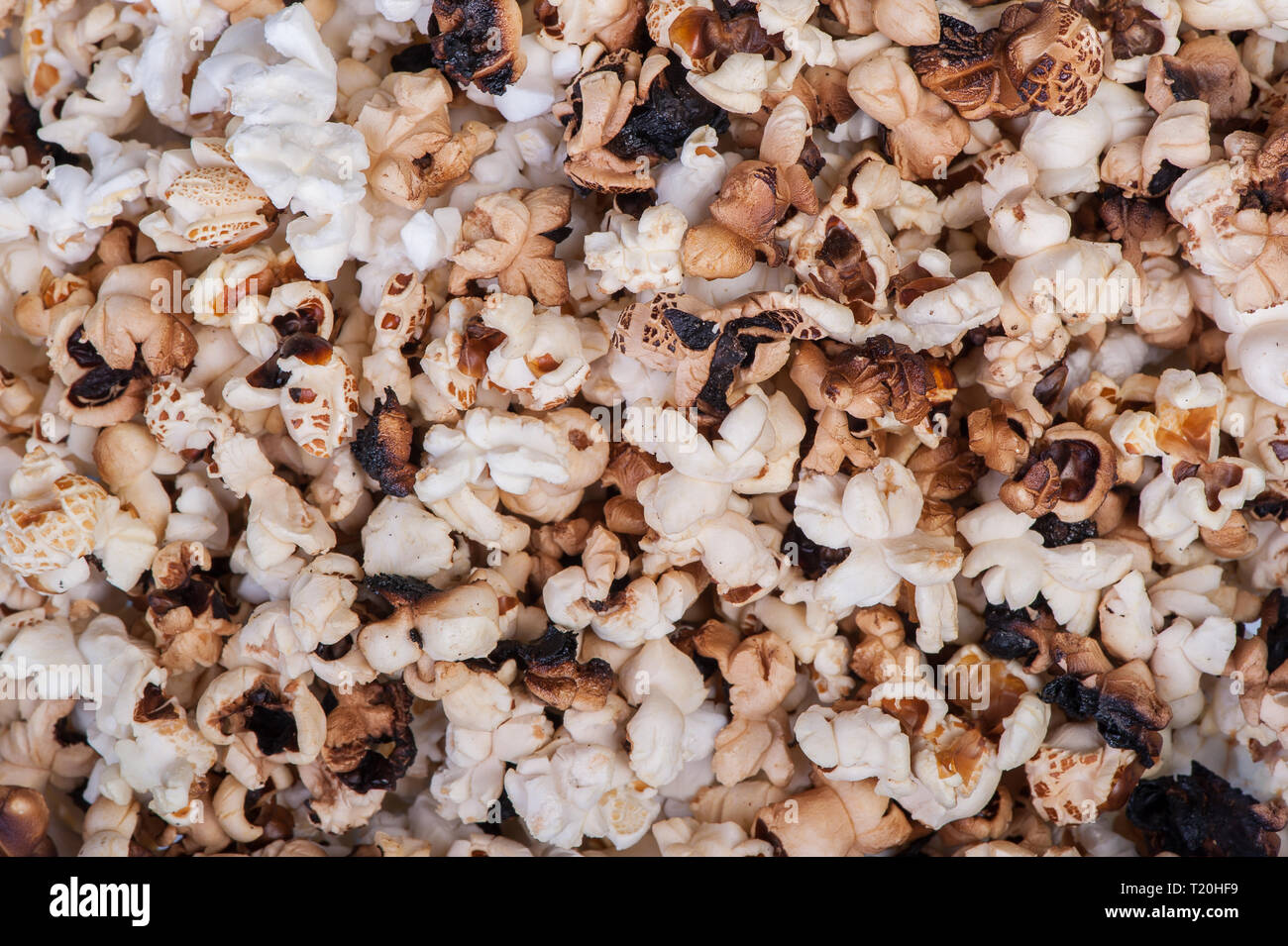 Texture of burnt popcorn background Stock Photo - Alamy