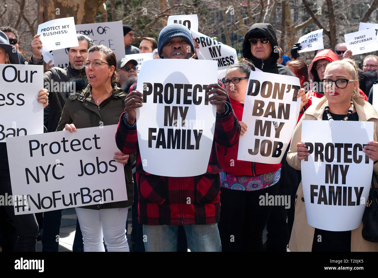 New York, United States. 28th Mar, 2019. On Thursday, March 28th, a coalition of fur store owners and fur trade employees gathered outside City Hall in New York City to protest the introduction of a bill that would prohibit the sale of fur apparel in New York City. A similar bill was introduced in the New York State Assembly which would ban the sale statewide. Credit: Gabriele Holtermann-Gorden/Pacific Press/Alamy Live News Stock Photo