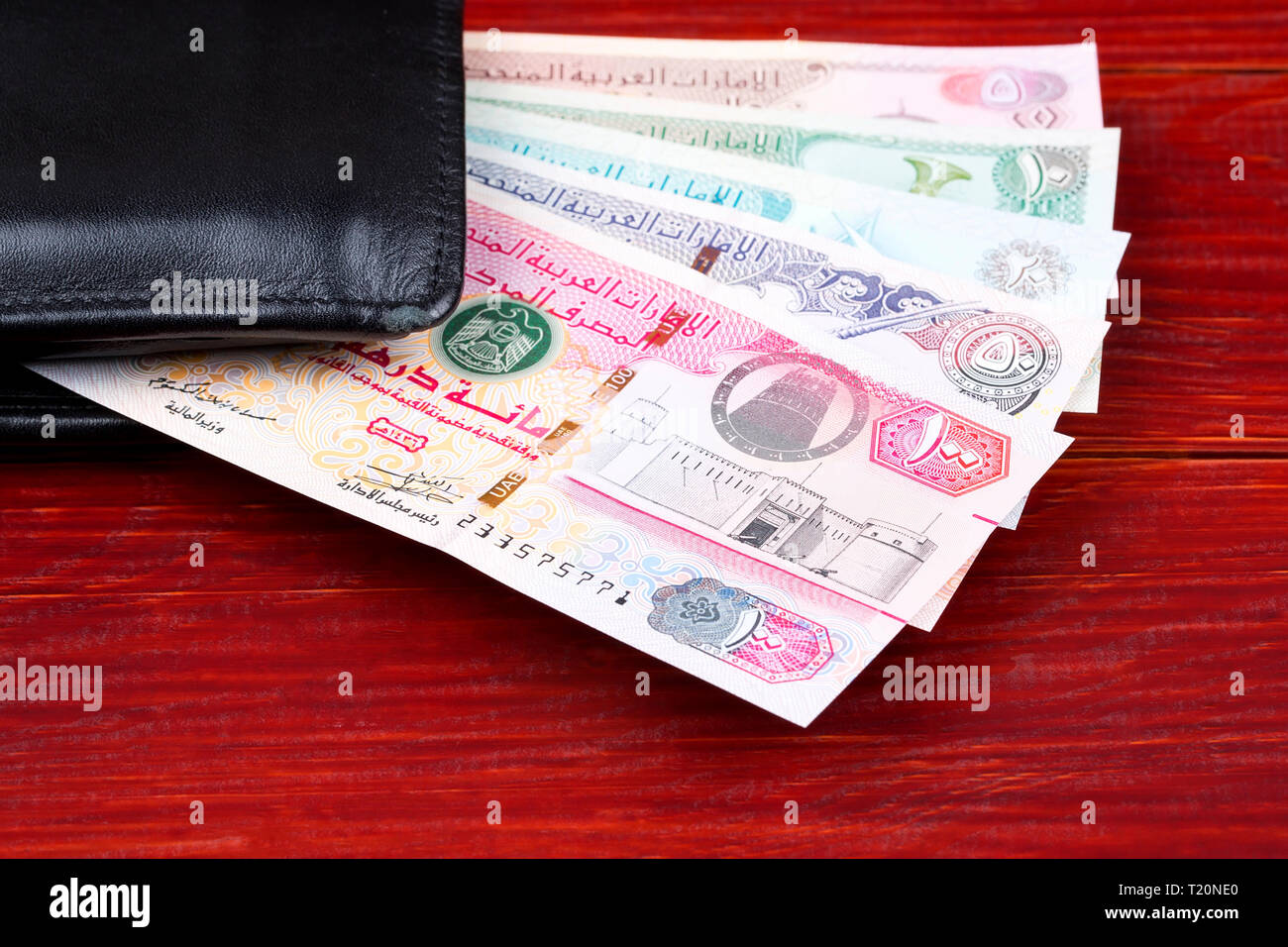 United Arab Emirates Dirham in the black wallet Stock Photo - Alamy