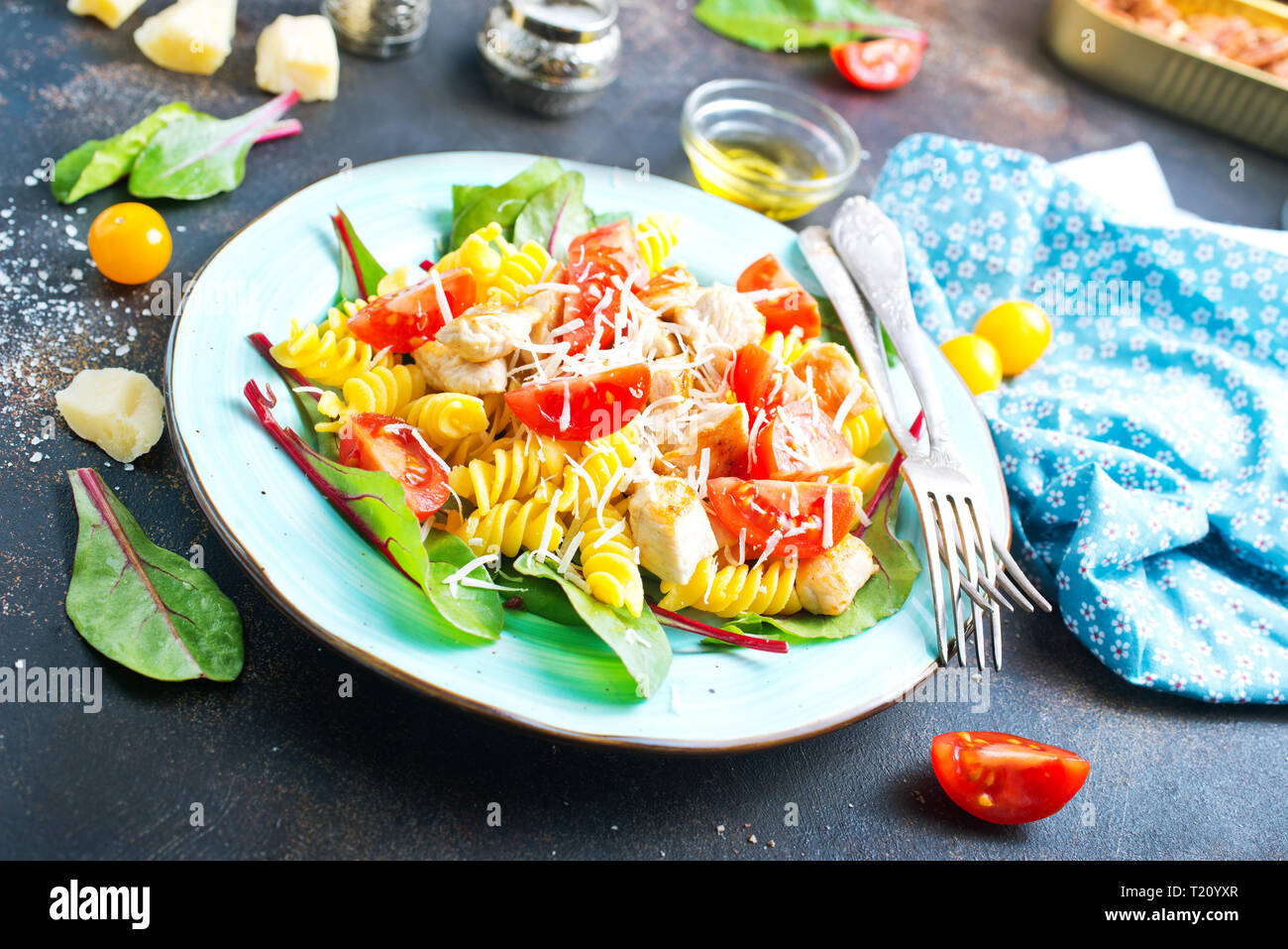 boiled pasta with chicken and gresh tomato Stock Photo